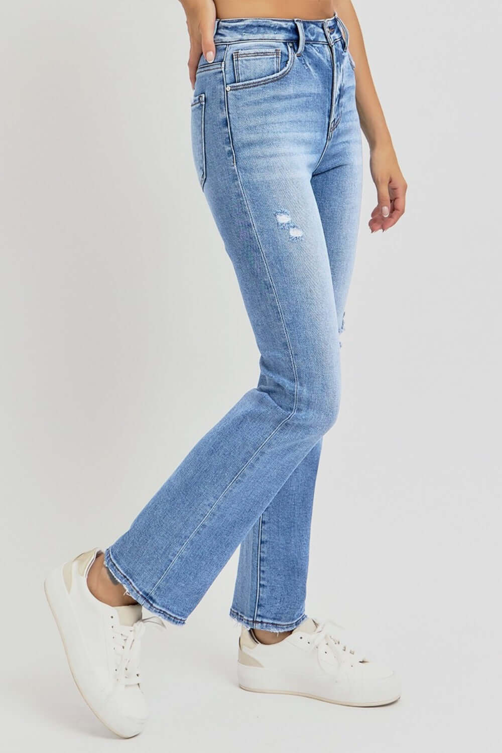 Risen full size distressed high-rise ankle straight jeans with a vintage vibe and comfortable fit, paired with white sneakers.