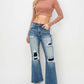 High Rise Distressed Ankle Flare Jeans | Petite featuring Risen Jeans with a chic, modern design and flattering ankle flare silhouette.