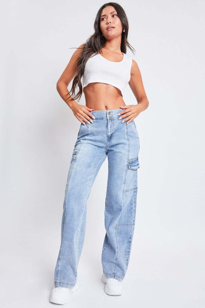 Woman wearing YMI High-Rise Straight Cargo Jeans with front seams, patch pockets, and flap cargo pockets, paired with a white crop top.