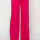 High Rise Wide Leg Jeans in vibrant pink, offering a stylish and comfortable fit, perfect for elongating legs and adding a retro-inspired touch.