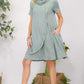 CELESTE Full Size Decor Button Short Sleeve Dress with Pockets at Bella Road