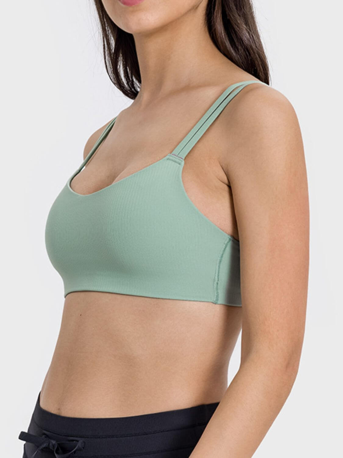 Side view of Millennia Scoop Neck Double Strap Active Cami in mint green, featuring a scoop neck and playful double straps.