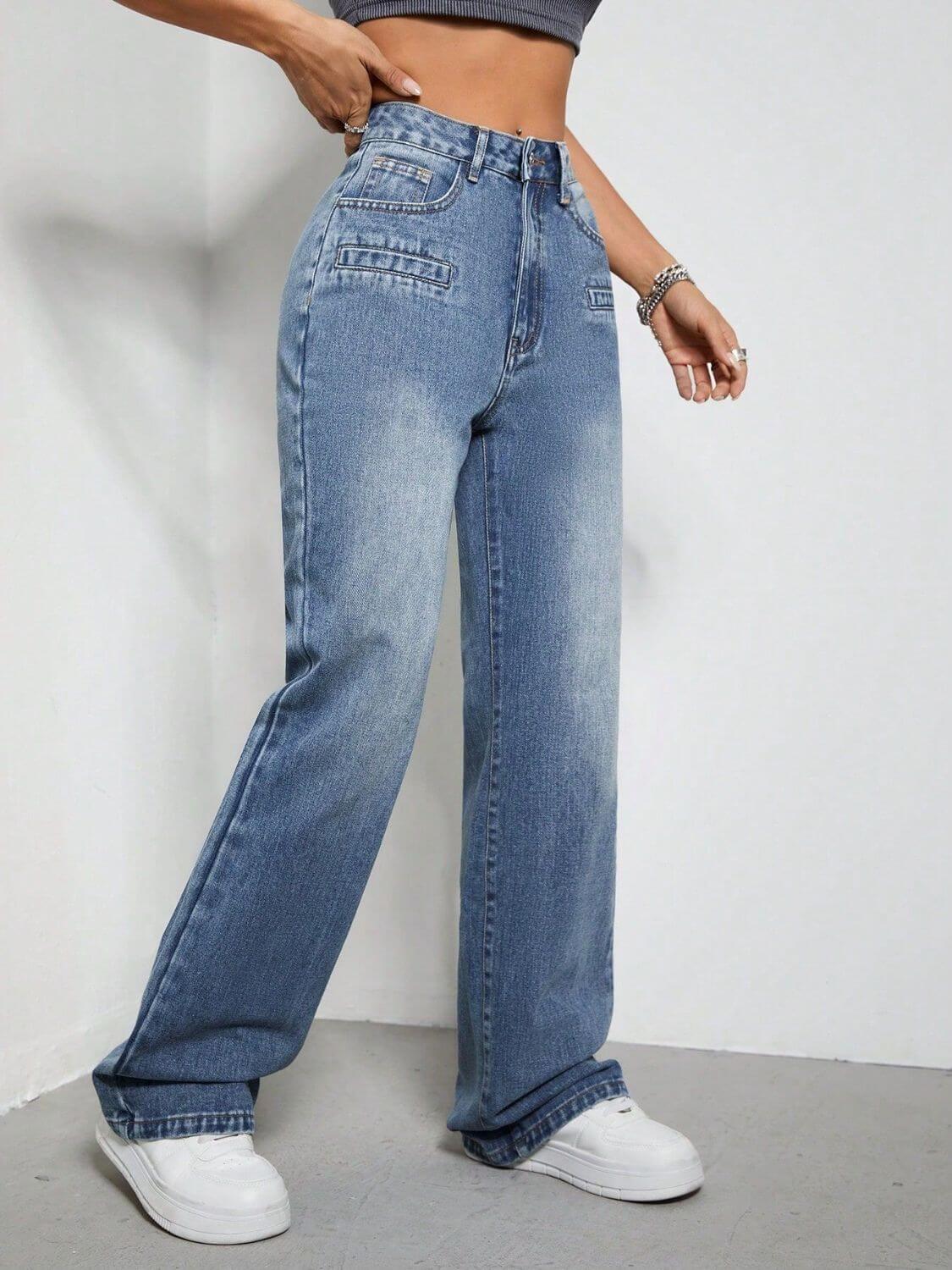 Woman wearing Bella Road High Rise Wide Leg Jeans with Pockets, slightly stretchy denim, buttoned front, casual fashion fit.