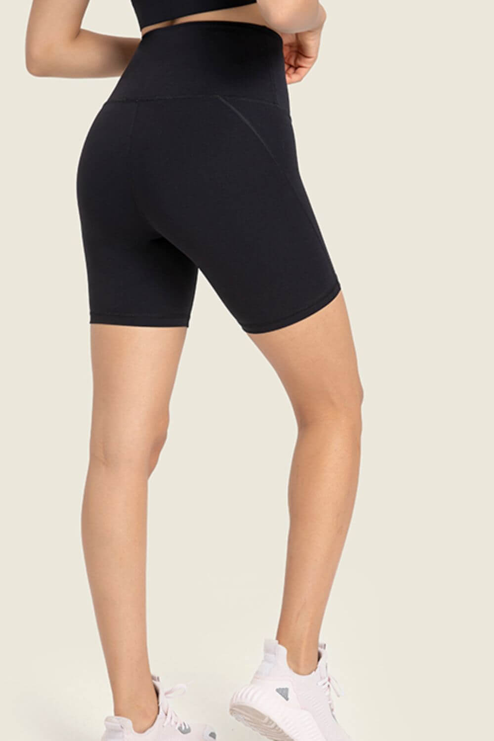 Millennia Seamless High-Rise Biker Shorts in black, showcasing a smooth, supportive wide waistband and stylish fit.