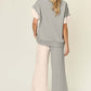 DOUBLE TAKE Full Size Texture Contrast T-Shirt and Wide Leg Pants Set at Bella Road