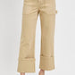 RISEN Full Size High Rise Wide Straight Cuffed Patch Jeans in beige, featuring spacious pockets and stylish cuffed bottoms.