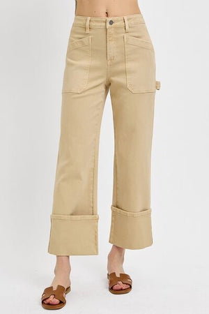 RISEN Full Size High Rise Wide Straight Cuffed Patch Jeans in beige, featuring spacious pockets and stylish cuffed bottoms.