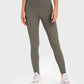 Model wearing Millennia Highly Stretchy Wide Waistband Yoga Leggings in olive green for a stylish workout look.