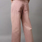 Back view of stylish pastel pink POL Embellishments Gradient Wide Leg Pants with pockets and decorative details.