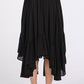 Back view of Mittoshop black handkerchief hem midi skirt with elastic waistband and flowy silhouette, perfect for any occasion.