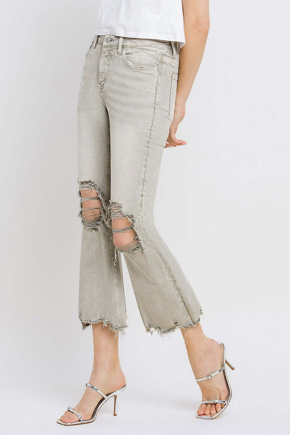 Lovervet distressed raw hem cropped flare jeans with urban flair and trendy unfinished edge, perfect for a vintage-inspired outfit