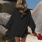 Stylish Bella Road Swim black embroidered cover-up perfect for beach lounging, with open front and long sleeves.