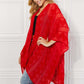 JUSTIN TAYLOR Pom-Pom Asymmetrical Poncho Cardigan in Red at Bella Road