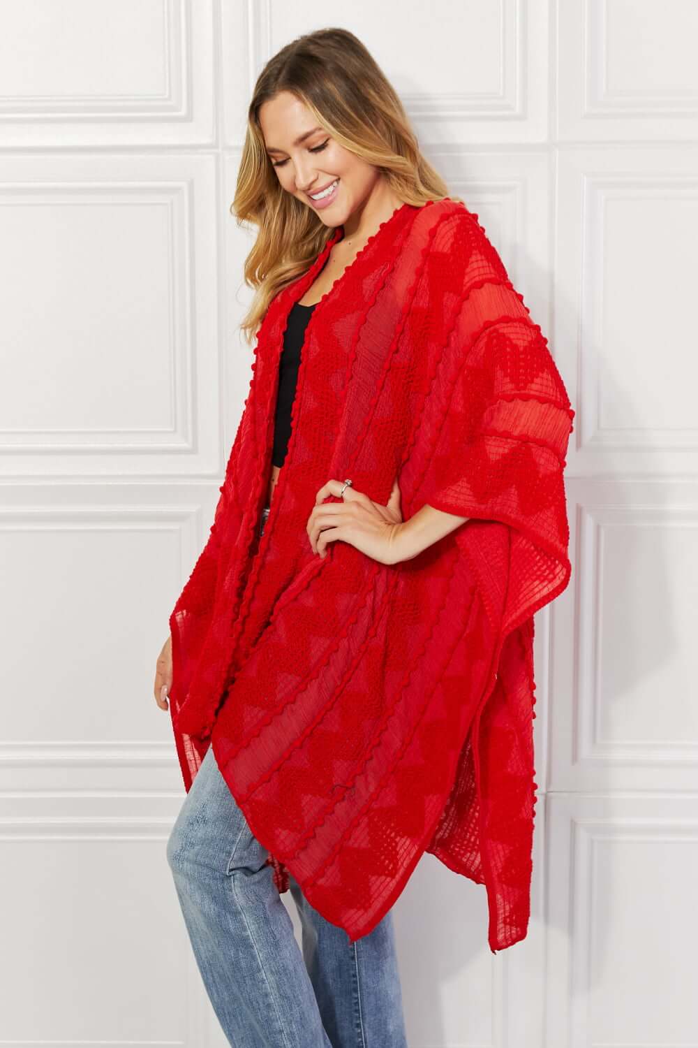 JUSTIN TAYLOR Pom-Pom Asymmetrical Poncho Cardigan in Red at Bella Road