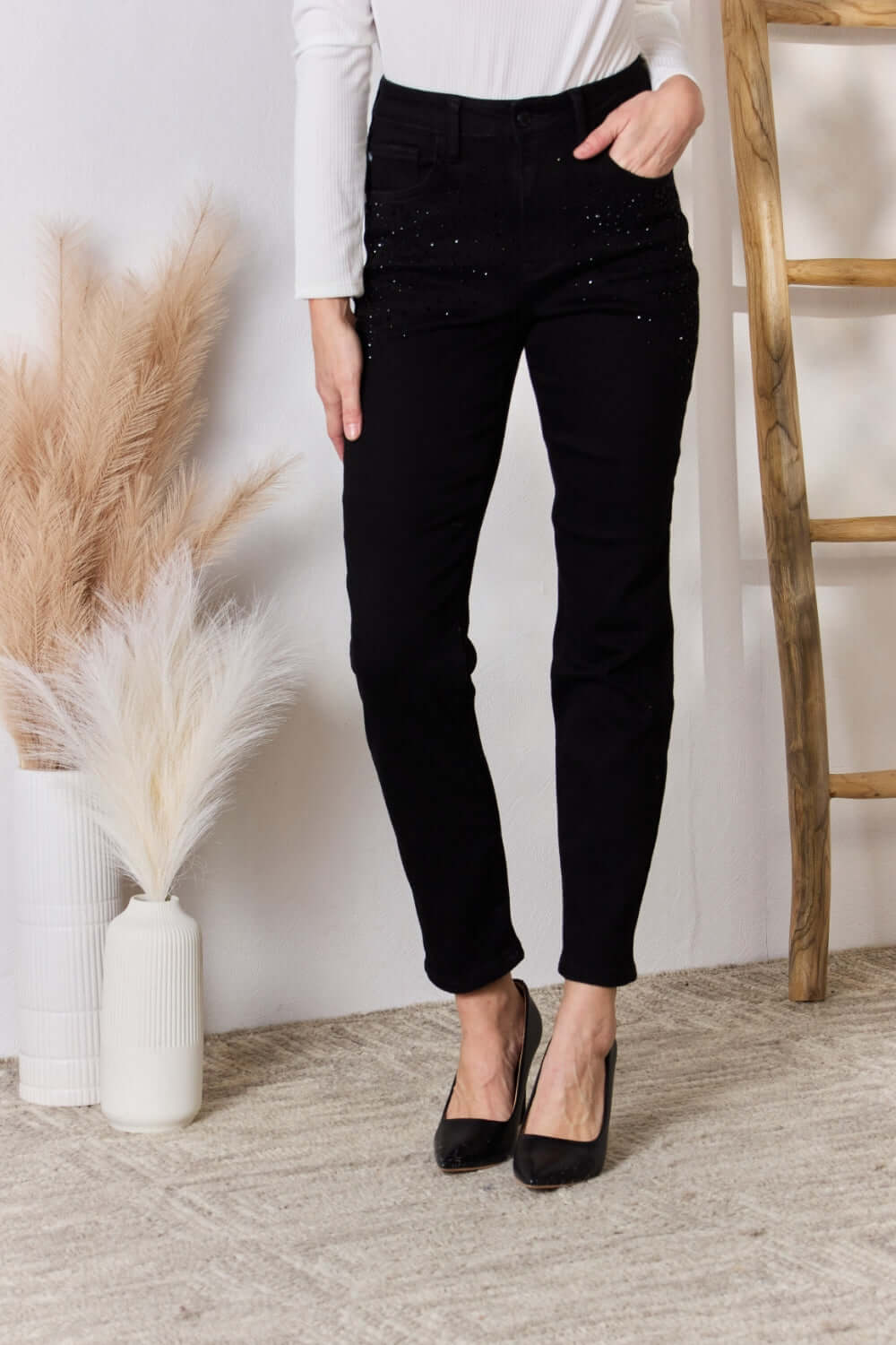 Model wearing Judy Blue Jeans rhinestone embellished slim fit, full size black jeans with high waist and slightly stretchy fabric.