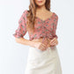 TASHA APPAREL Floral Ruffle Smocked Back Ruched Crop Top at Bella Road