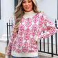 Woman wearing Angel Wings Flower Turtleneck Sweater with floral design outdoors. Perfect stylish touch for any outfit.