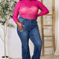 Woman wearing round neck long sleeve semi-sheer bodysuit paired with high-waisted bootcut jeans in casual setting.