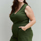 Plus-size model wearing Forever Yours V-Neck Sleeveless Romper in Army Green with hands in pockets