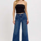 Model showcasing RISEN Elastic Band Wide Leg Jeans with a relaxed fit and comfortable style.