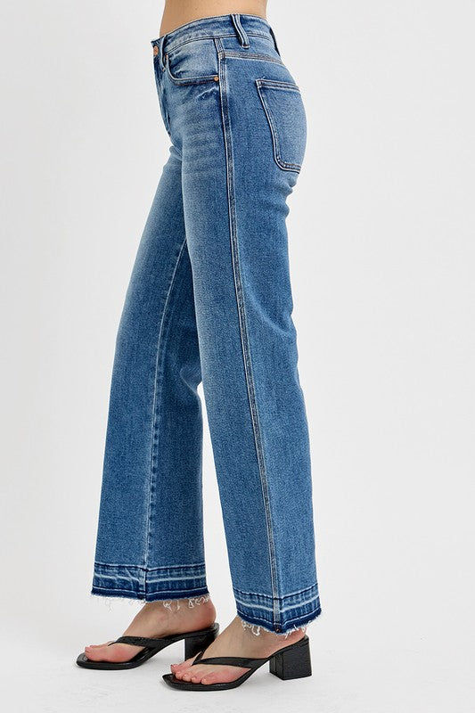 RISEN Full Size Raw Hem Ankle Bootcut Jeans featuring a trendy raw hem and flattering silhouette for stylish looks.