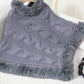 Cozy gray Bella Road Fuzzy Hem Cable-Knit Poncho with a fluffy hem, perfect for chilly days.