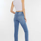 Back view of woman wearing Cat's Whiskers High Waist Jeans with vintage detailing, showcasing a flattering silhouette.