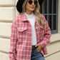 Woman wearing Bella Road Plaid Collared Neck Long Sleeve Jacket standing outside a building.