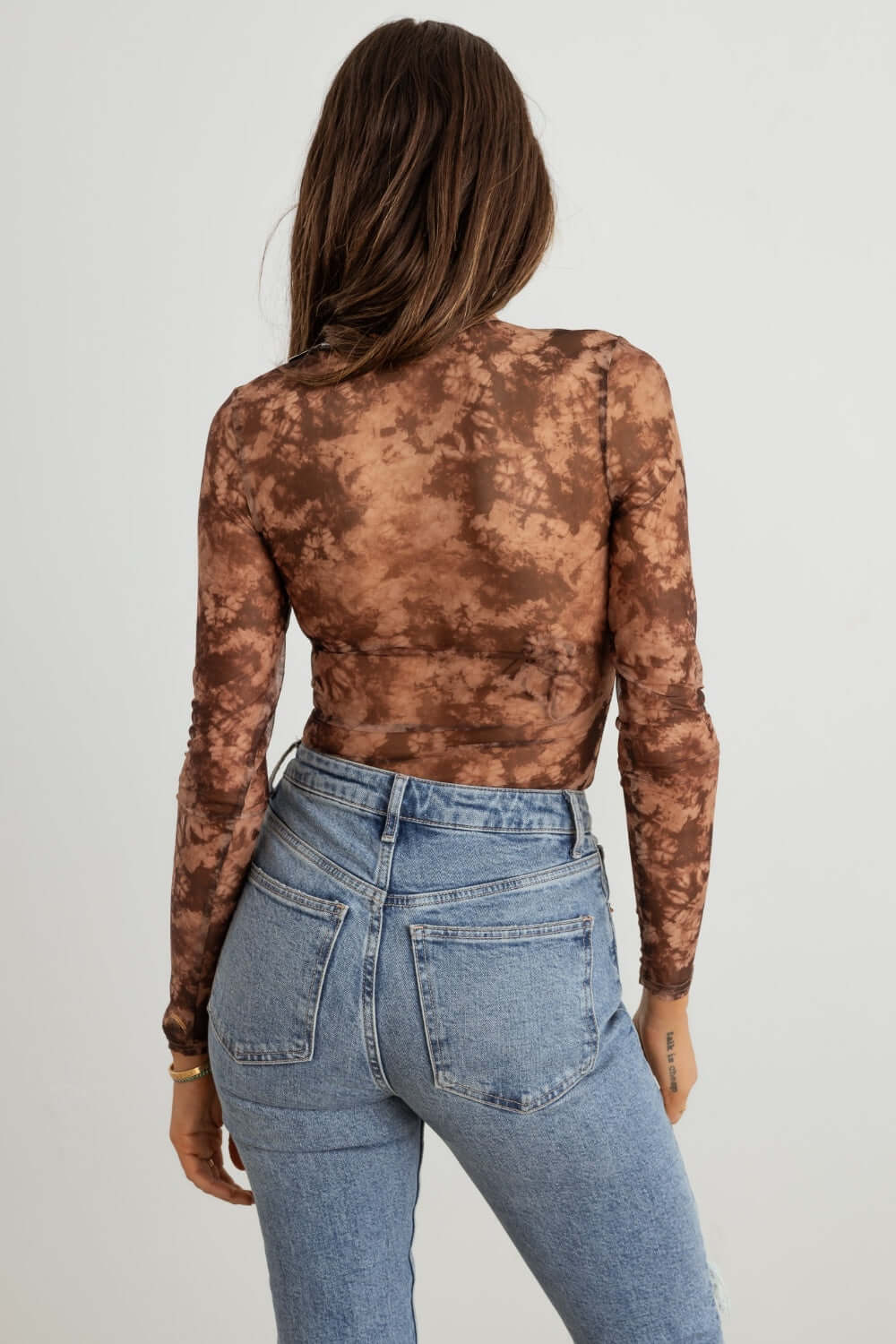 TASHA APPAREL Abstract Mesh Lace-Up Long Sleeve Bodysuit at Bella Road