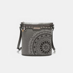 Nicole Lee USA crossbody bag with metallic stitching, embroidery, and rhinestones, featuring convenient front and back zip pockets.