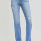 Distressed high-rise ankle straight jeans in light blue denim with a trendy, vintage vibe, perfect for casual or dressed-up outfits.