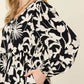 DOUBLE TAKE Full Size Printed Ruffle Hem Long Sleeve Dress at Bella Road