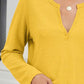 Woman wearing Bella Road Waffle-Knit Notched Long Sleeve T-Shirt in yellow, showing textured fabric and notched neckline.