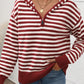 Cozy burgundy striped long sleeve hooded sweater for chilly days, adding fun to any outfit. Perfect blend of acrylic and polyamide.