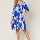 DOUBLE TAKE Full Size Floral Ruffle Hem Smocked Dress at Bella Road