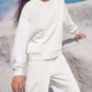 Stylish Bella Road white top and pants set with round neck and long sleeves, perfect for all-day comfort and fashion-forward style.