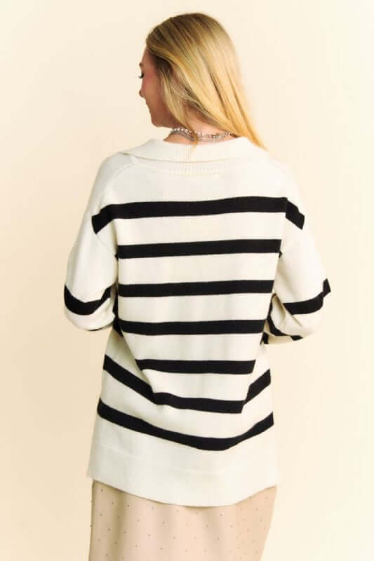 Back view of Davi & Dani high-low striped Johnny collar sweater showcasing chic design and stylish stripes.