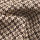 Close-up of Perfee Plaid Lapel Collar Long Sleeve Blazer fabric featuring a classic houndstooth pattern in shades of brown and beige.