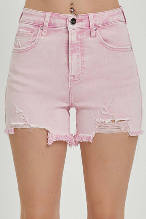 Pink high-rise distressed denim shorts by Risen Jeans, featuring a flattering fit and edgy ripped detailing for a casual summer look.