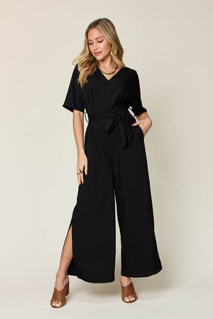 DOUBLE TAKE Full Size V-Neck Tie Front Short Sleeve Slit Jumpsuit at Bella Road