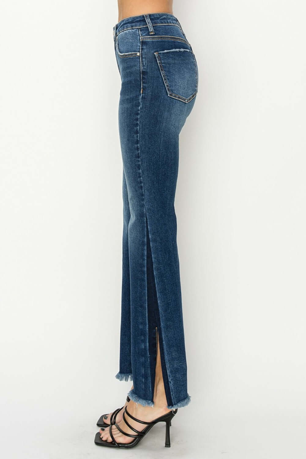 Stylish high rise side shadow seam detail slit flare jeans by Risen Jeans. Perfect for a trendy, chic look.