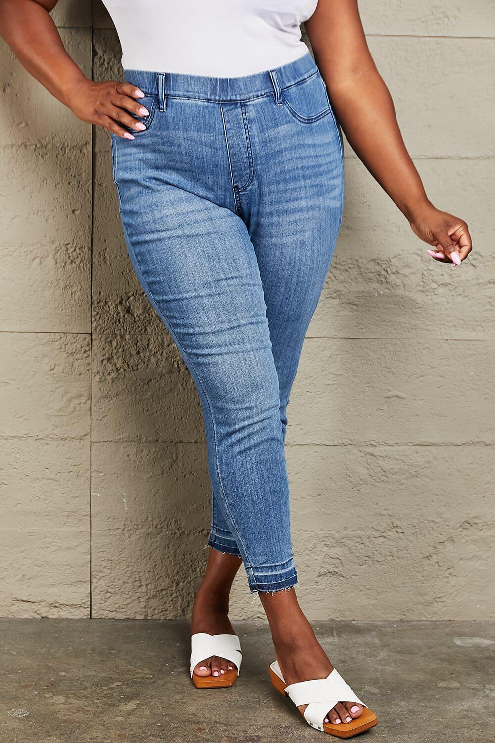 Janavie Full Size High Waisted Pull On Skinny Jeans with release hem detailing, crafted from premium stretch denim for a flattering fit.