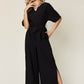 DOUBLE TAKE Full Size V-Neck Tie Front Short Sleeve Slit Jumpsuit at Bella Road