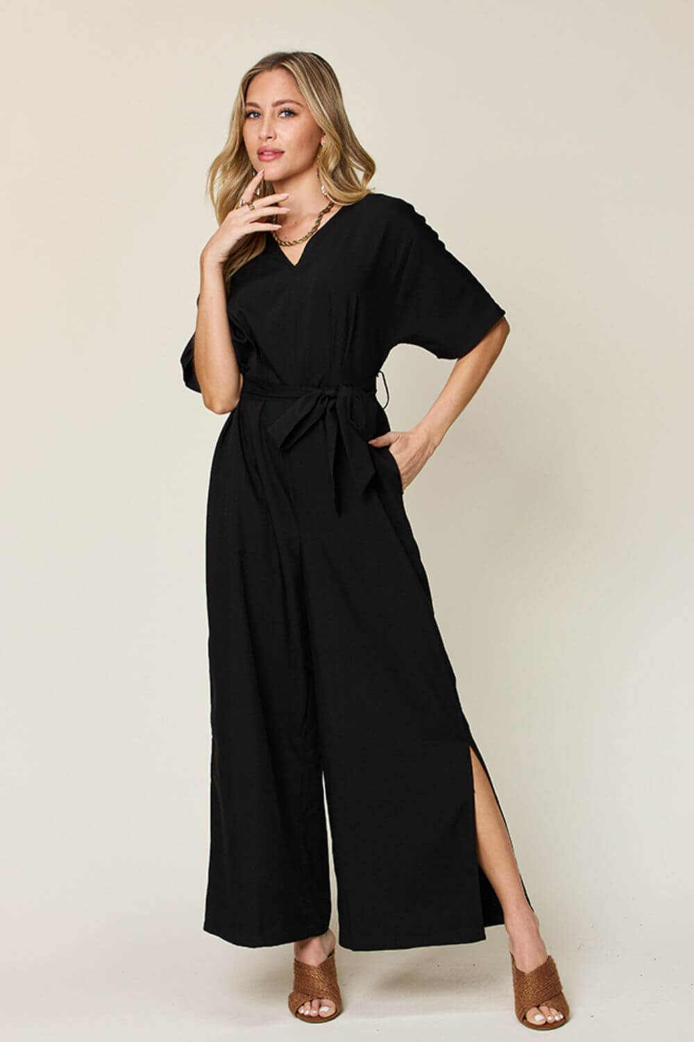 DOUBLE TAKE Full Size V-Neck Tie Front Short Sleeve Slit Jumpsuit at Bella Road