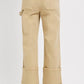 Back view of RISEN full size high rise wide straight cuffed patch jeans in beige with stylish cuffed bottoms.