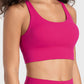 Bright pink active tank top with scoop neck and wide straps, perfect for workouts and stylish comfort.