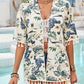 Woman in floral tassel cover-up by the pool, showcasing playful beach style with an open front and half sleeves.