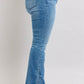 Side view of Judy Blue high waist tummy control vintage wash slim bootcut jeans with trendy side slit detail.