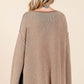 Mittoshop mineral wash sweater back view with patch pockets and cut edge detailing for casual chic style.