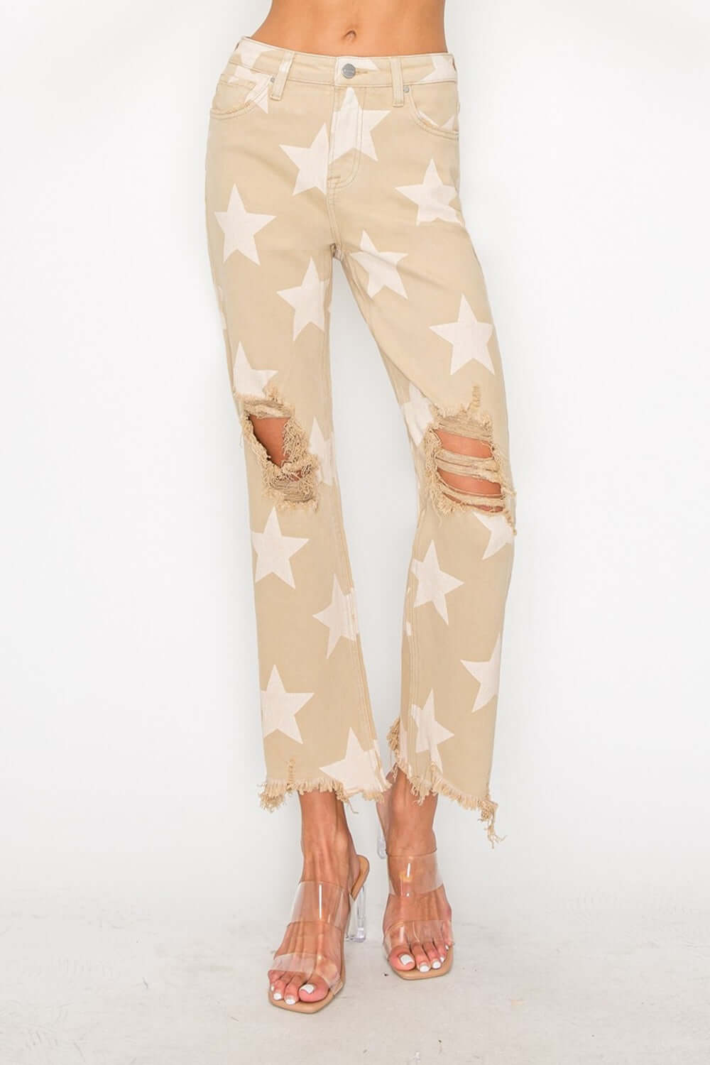 Star printed frayed hem jeans with high rise waist, perfect for stylish and edgy outfits.